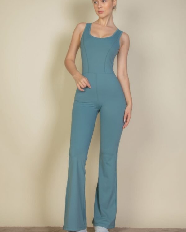 Solid Flare Leg Sports Jumpsuit, designed for those who want both style and functionality. This skin-tight jumpsuit offers an incredible 4-way stretch and breathable material