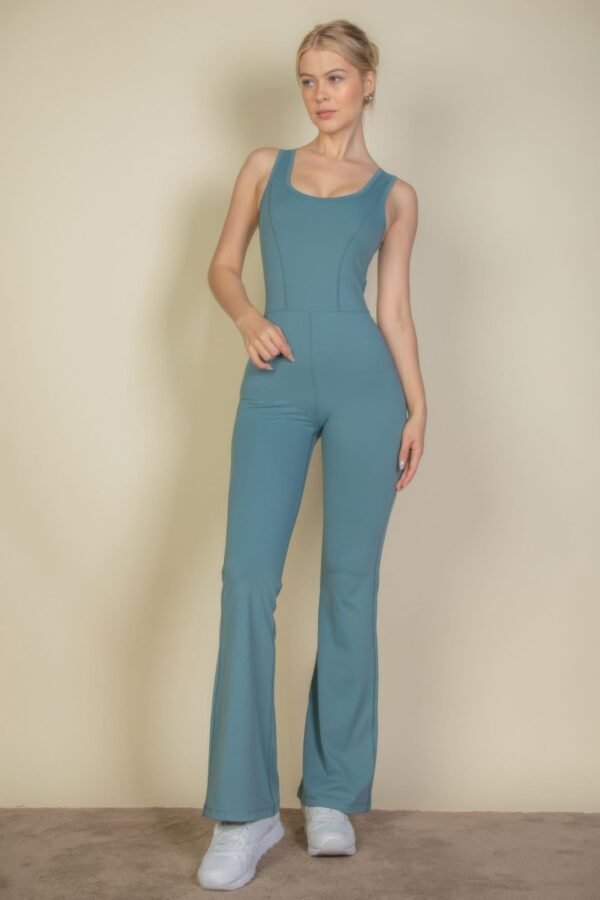Solid Flare Leg Sports Jumpsuit, designed for those who want both style and functionality. This skin-tight jumpsuit offers an incredible 4-way stretch and breathable material