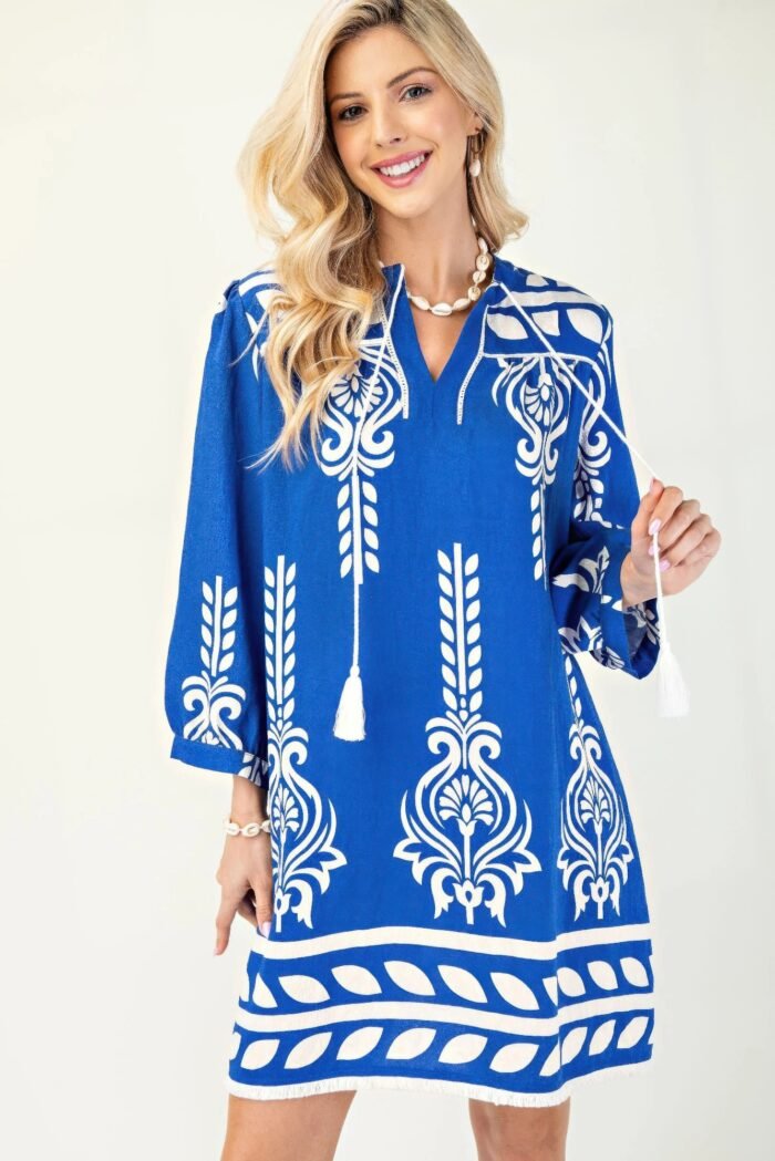 Printed 3/4 sleeve dress with tassel tie and fringe detail on hem