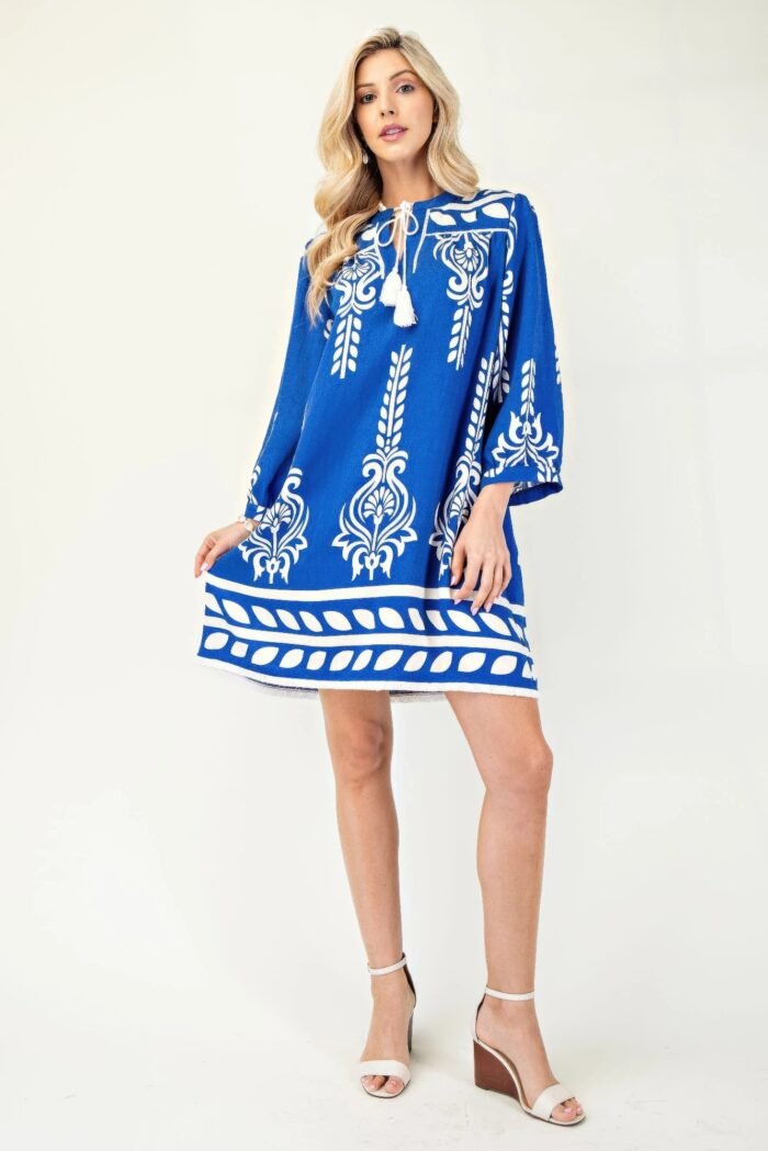 Printed 3/4 sleeve dress with tassel tie and fringe detail on hem