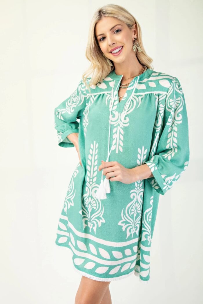 Printed 3/4 sleeve dress with tassel tie and fringe detail on hem