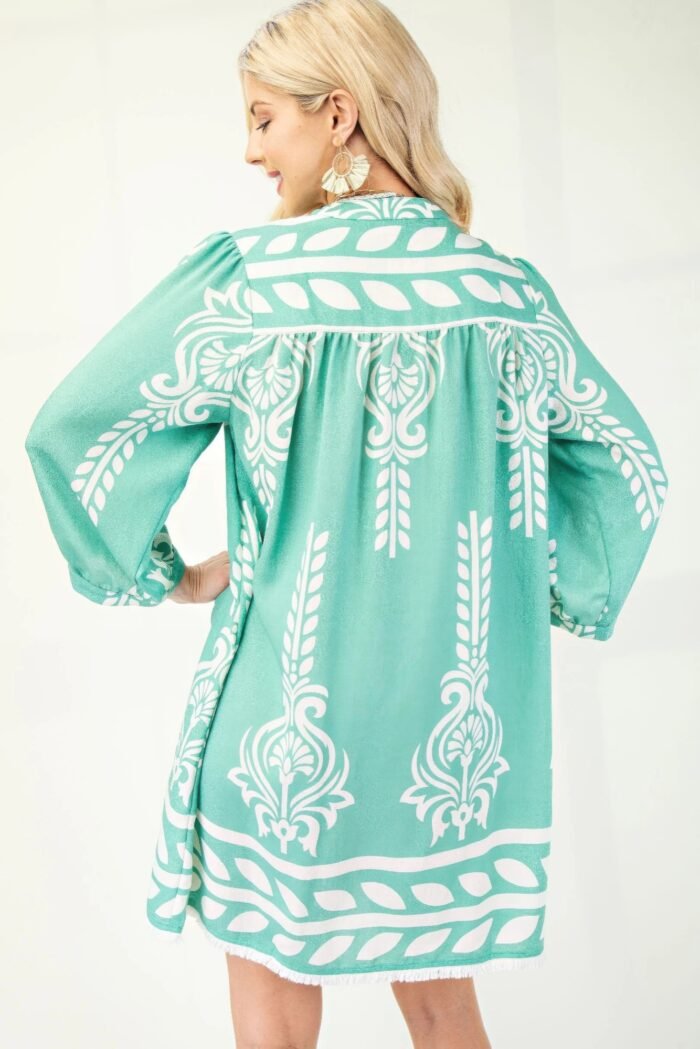 Printed 3/4 sleeve dress with tassel tie and fringe detail on hem