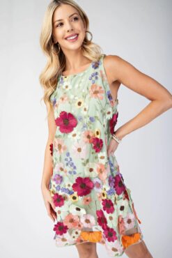 3D floral embroidered mini dress in white with sleeveless design and romantic detailing