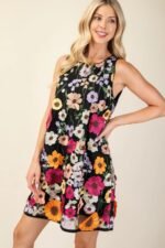 3D floral embroidered mini dress in white with sleeveless design and romantic detailing