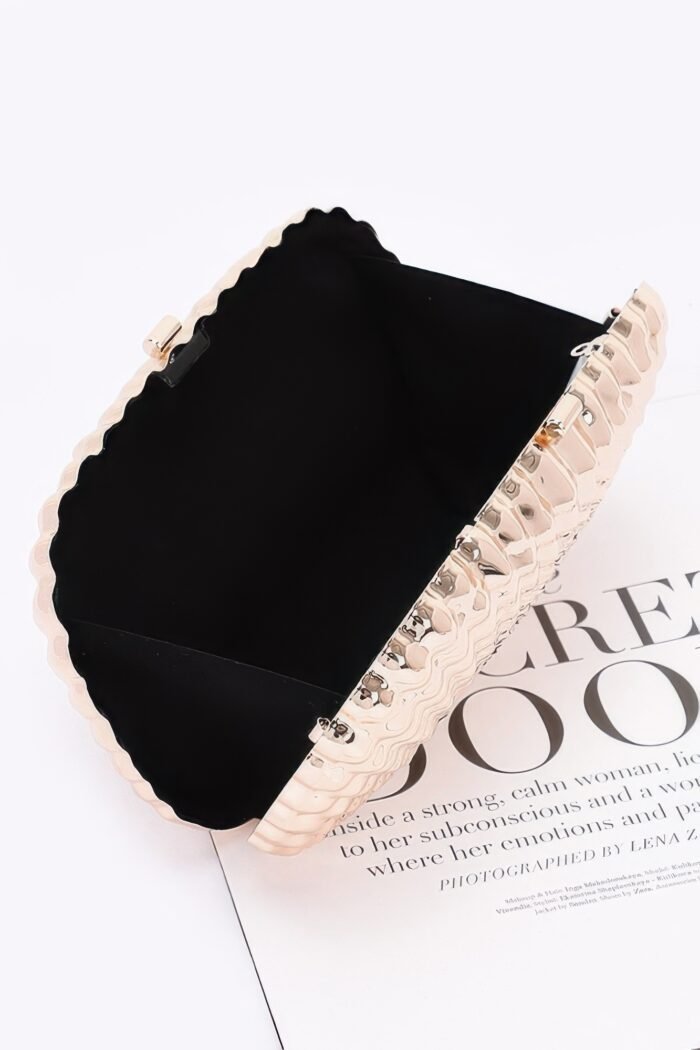 Metal case clutch