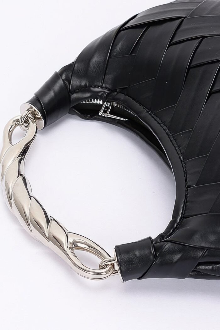 Faux leather braided metal handle clutch
