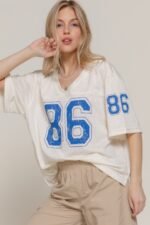 Oversized mesh baseball t-shirt with silk screen print, short sleeves, and breathable fabric – streetwear-inspired sporty unisex top.