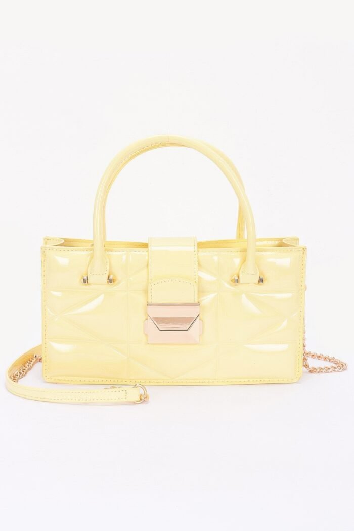 Embossed enamel handle clutch