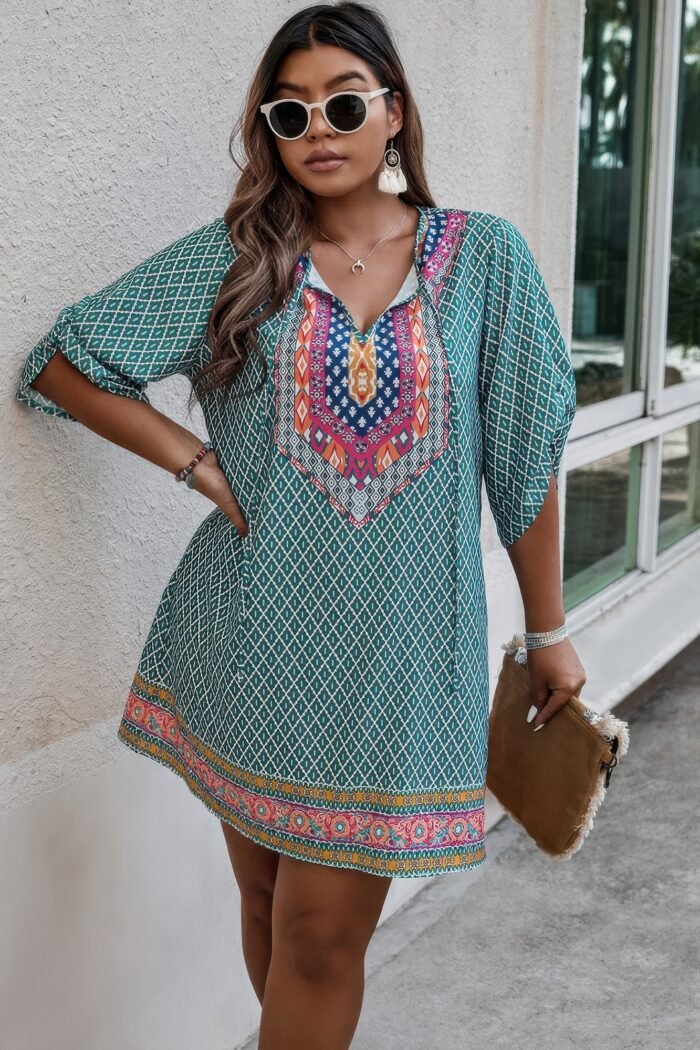 Plus size v neck printed loose fit midi dress - image 1