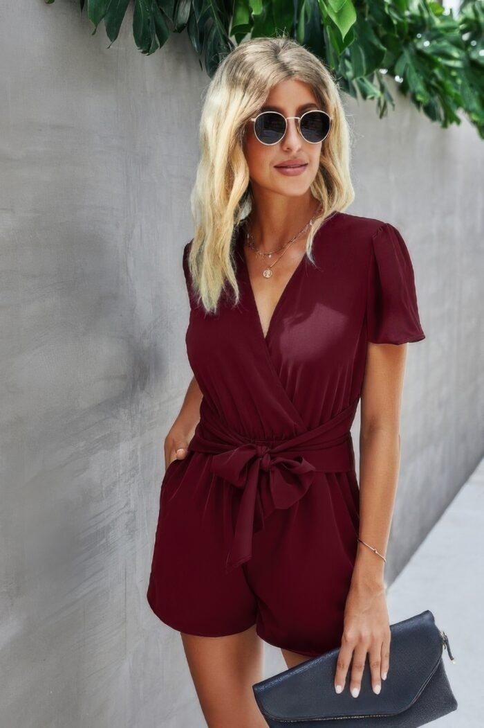 Stretch belted plunge neck wrap knot side romper
