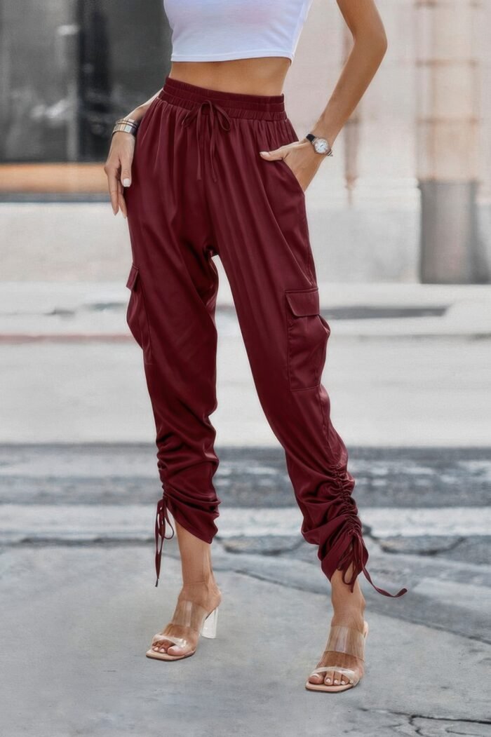 Solid drawstring hem flap pocket side stacked pant