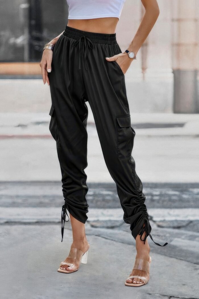 Solid drawstring hem flap pocket side stacked pant