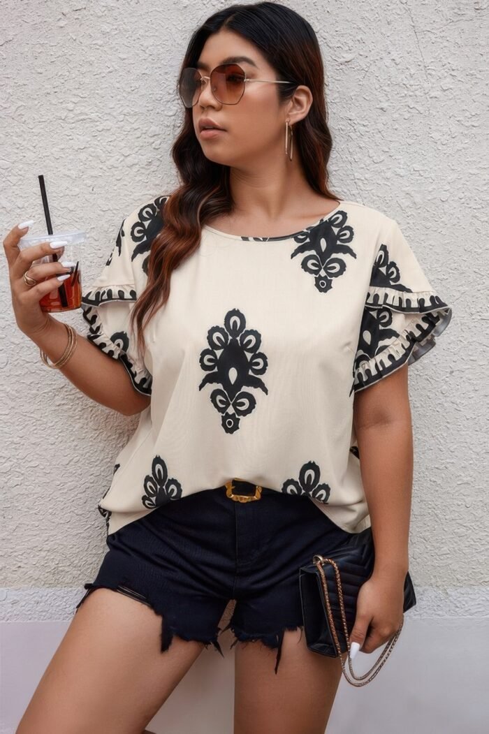 Plus printed ruffle hem wide round neck blouse