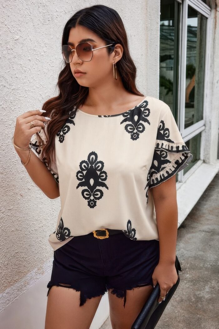 Plus printed ruffle hem wide round neck blouse