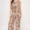 Model wearing paper bag waist pants set with sleeveless printed bubble hem top – breathable summer outfit
