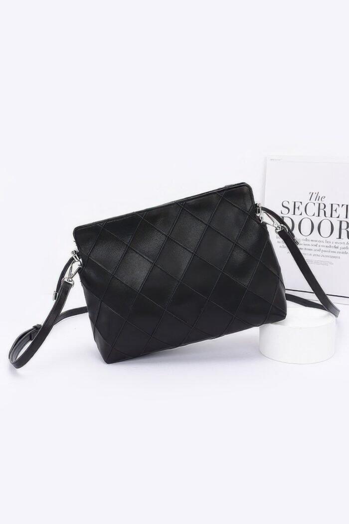 Quilted faux leather bucket crossbody bag - image 1