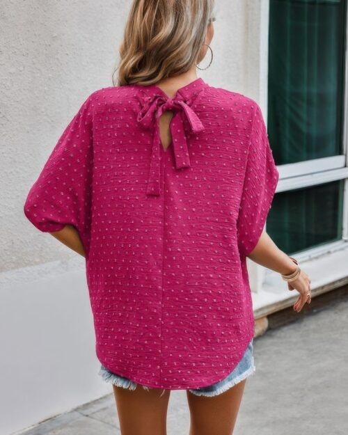 solid swiss dot mock neck drop shoulder blouse