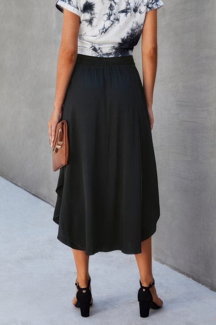 Solid shirred waist asymmetrical hem flared skirt - image 2