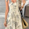 Allover Printed Tie Shoulder Pockets Romper