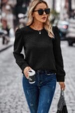 Woman wearing twist texture pullover – solid crewneck sweater with loose fit, textured knit fabric, available in multiple colors