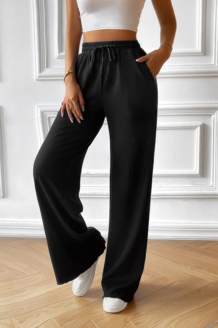 Solid pockets elastic waist loose straight pants - image 1