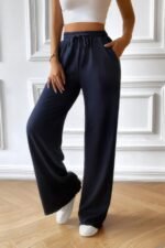Solid Pockets Elastic Waist Loose Straight Pants - Image 10