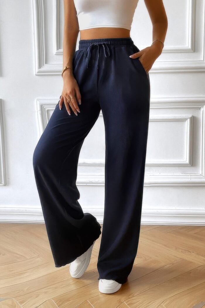 Solid pockets elastic waist loose straight pants - image 10