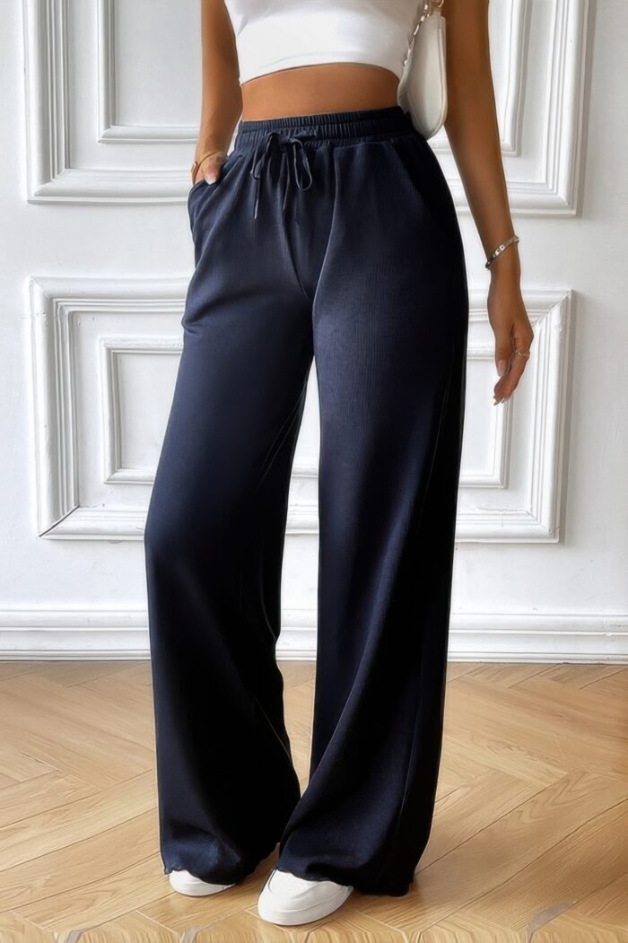 Solid pockets elastic waist loose straight pants - image 11