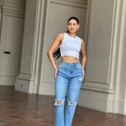 Medium Wash High Rise Jeans With Distress And Rips