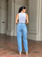 Medium Wash High Rise Jeans With Distress And Rips - Image 6