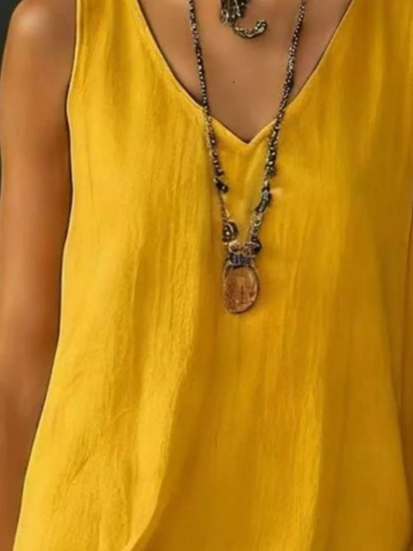 Full Size Ruffled Hem V-Neck Sleeveless Dress Plus Size 765fb5d8-713f-4ff3-9bb6-d7fc12d83780-Max-Origin