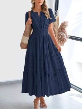 Full size short sleeve tiered midi dress plus size featuring a high smocked waist and a multi-layer flared skirt.