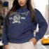 Plus size graphic kangaroo pocket drawstring hoodie with Eastcoast logo in black, navy, red, and white colors